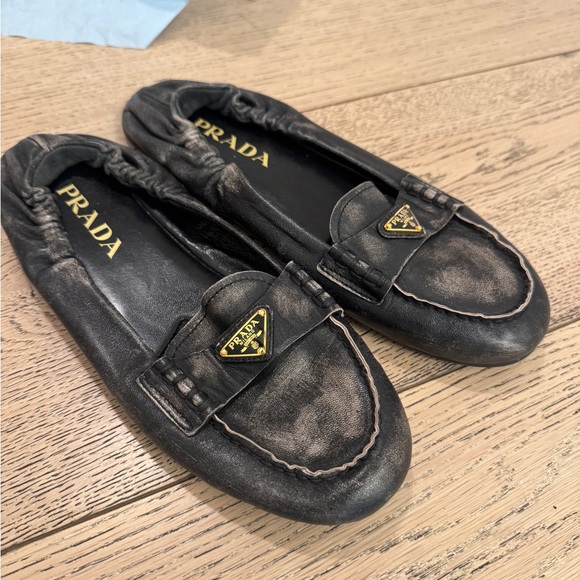 Prada Distressed Black Leather Loafers